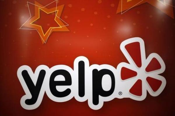 StockBeat - Yelp Climbs as Groupon Reportedly Eyes Deal