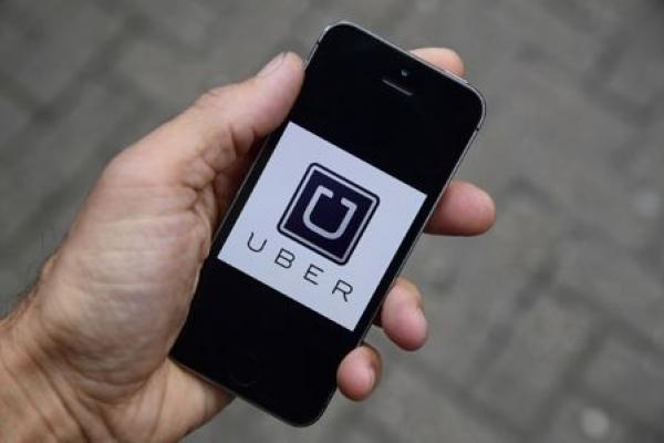 Stocks -  Uber, Big Lots Rise Premarket; Amazon, Tesla Fall