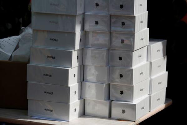 Stocks - Apple, Caterpillar Down in Premarket; Jobless Claims Surge
