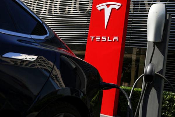 Stocks -  Tesla, Wells Fargo Fall in Pre-market; Mattel Rises