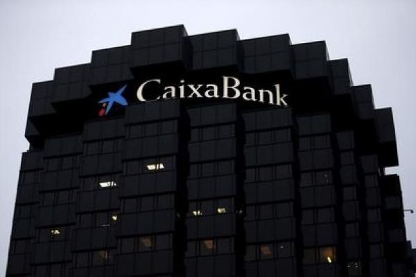 CaixaBank reduce el dividendo y el objetivo de ratio de solvencia