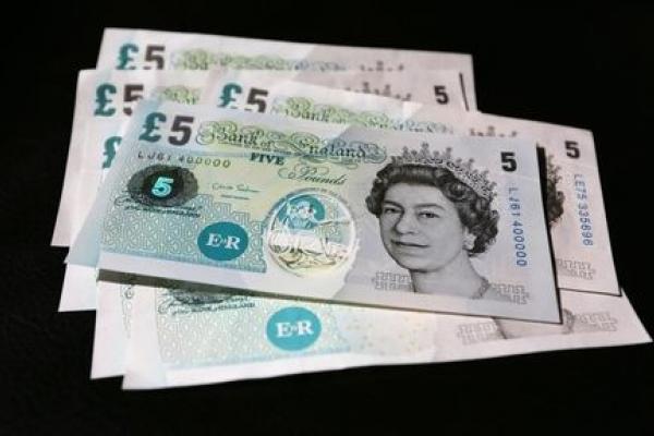 Pound Under Pressure as U.K. Services Suffer Worst Month Ever