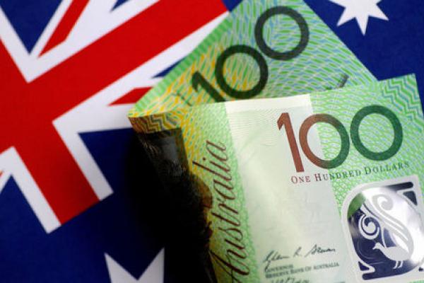 Aussie Drops on RBA Forecast Cut; U.S. Dollar Edges Up