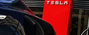 Stocks -  Tesla, Wells Fargo Fall in Pre-market; Mattel Rises