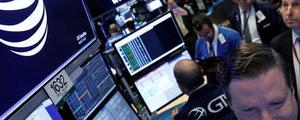 AT&T Rises 4%