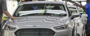 Michaels et Ford progressent en préouverture, Tesla recule
