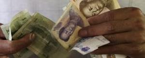 Yuan rutscht ab, trotz starker Daten aus Fabriken; US-Dollar fällt