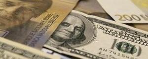 Dollar Edges Higher as Bullish Data Points to Economic Strength