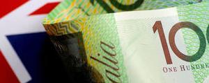 Aussie Drops on RBA Forecast Cut; U.S. Dollar Edges Up