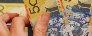 Aussie Dollar Plunges 3%; RBA Cuts Rates to Record Low