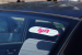 Lyft logo on a car glass