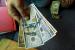 Dollaro in salita, preoccupa il Covid-19